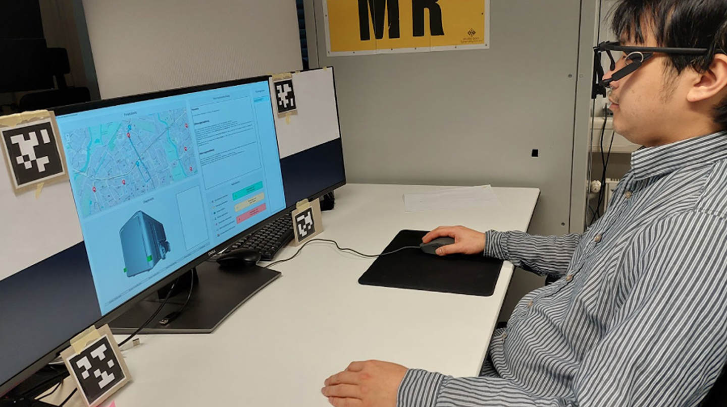 Participant with eye-tracking glasses at the workstation